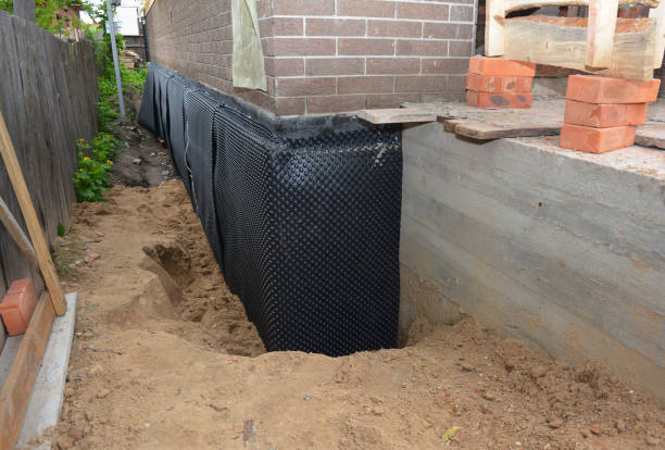 SJ Waterproofing Pros technician performing targeted Foundation Crack Repair assessment in Forest Junction, WI